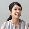 A woman wearing a striped top