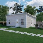 White single-story studio beside lawn path