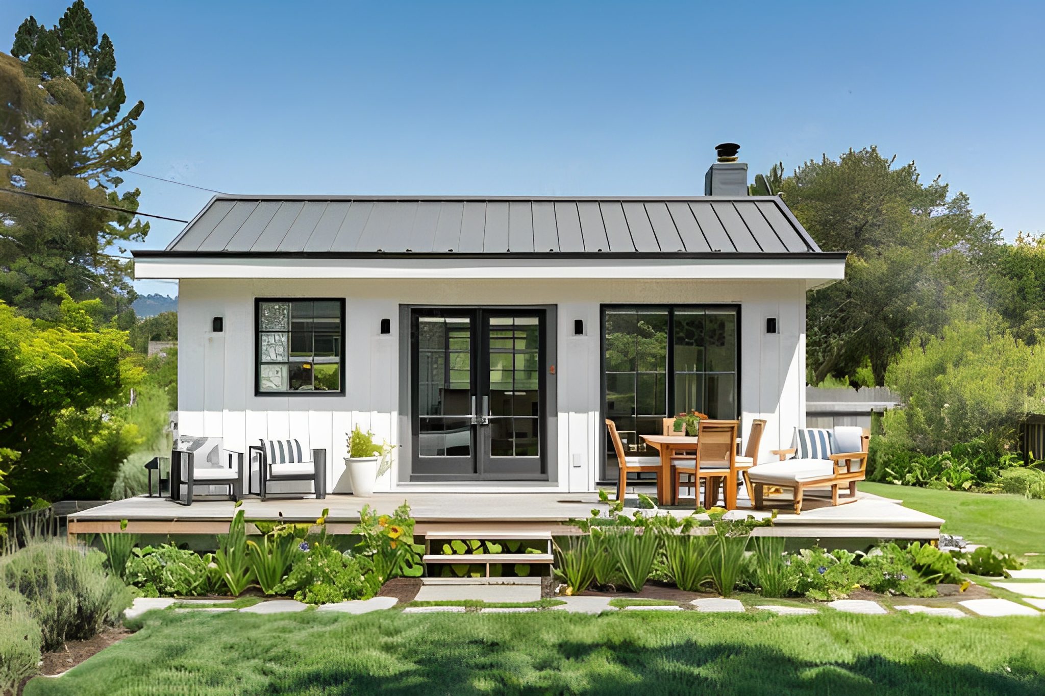 Compact modern backyard guesthouse with outdoor seating