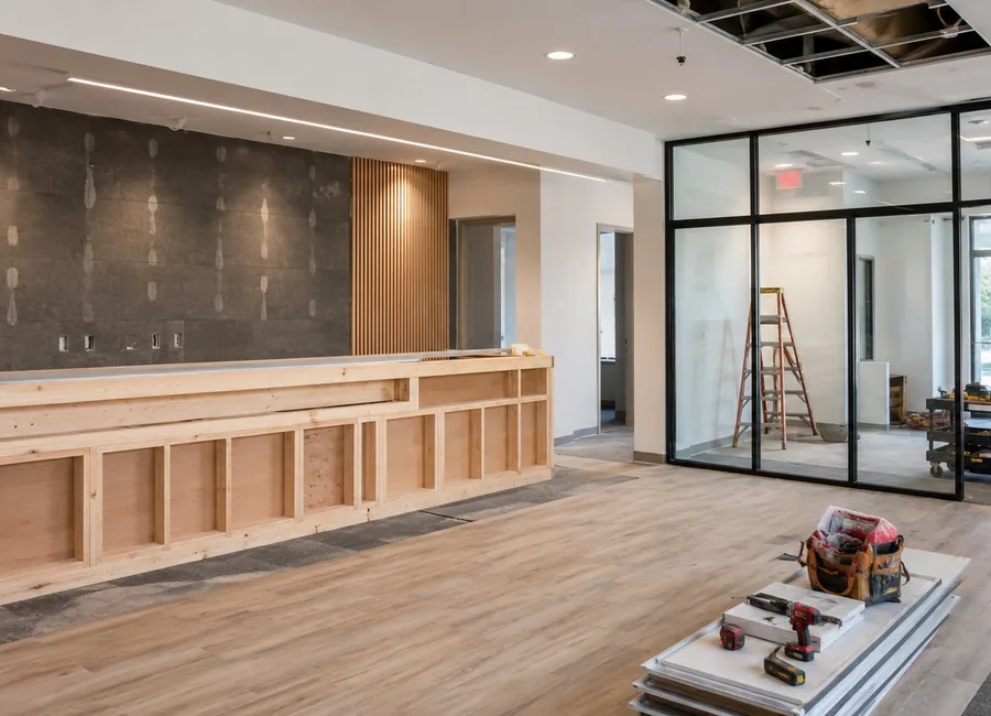 Tools on panels in unfinished office lobby