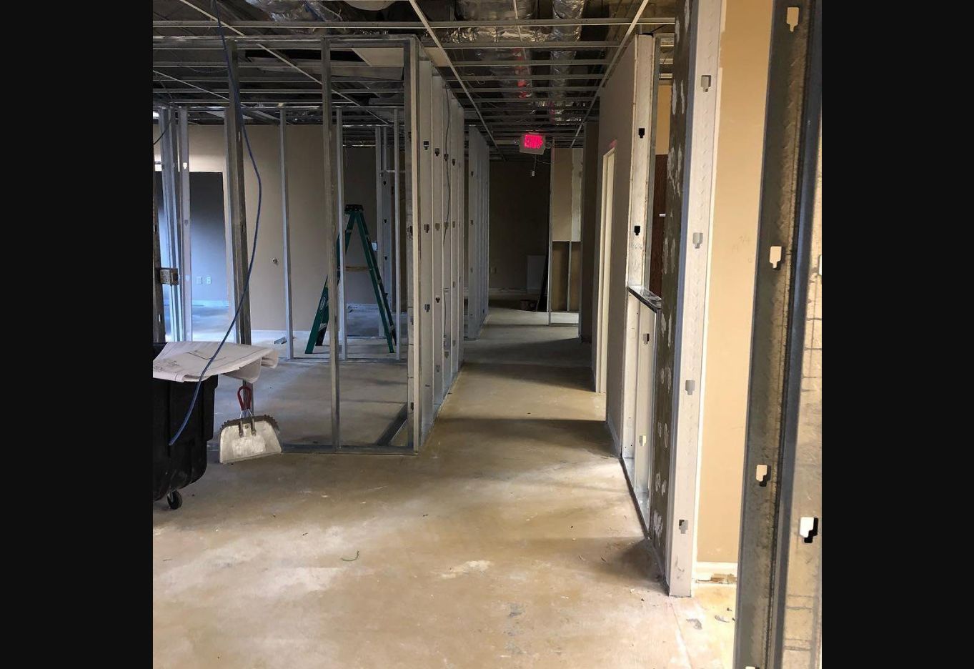 Metal-stud framed hallway under construction for a Residential Assisted Living conversion